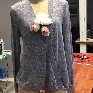 An incredible free flow top from a famous maker.